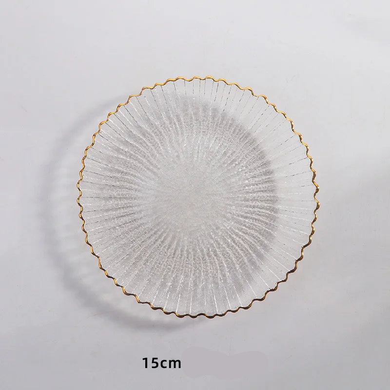 Assiette en verre transparente avec bordure dorée élégante de 15 cm, idéale pour des présentations raffinées.