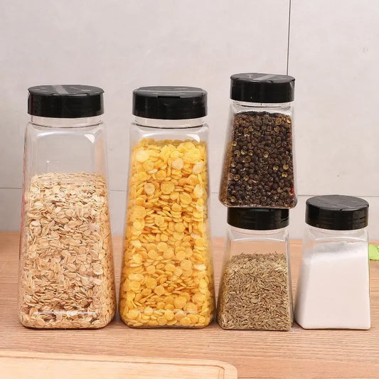 Ensemble de Bouteille à Épices Hermétique 270 900 ml en plastique transparent avec couvercles noirs rempli d'épices et céréales
