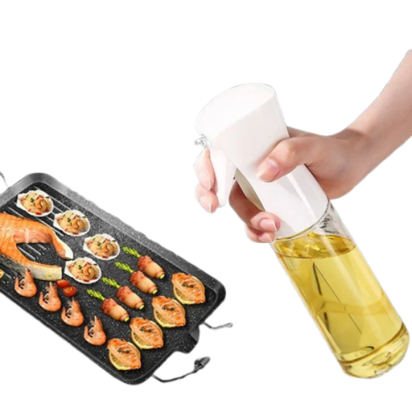 Bouteille Spray à Huile blanche utilisée pour vaporiser de l'huile sur des fruits de mer grillés sur une plaque