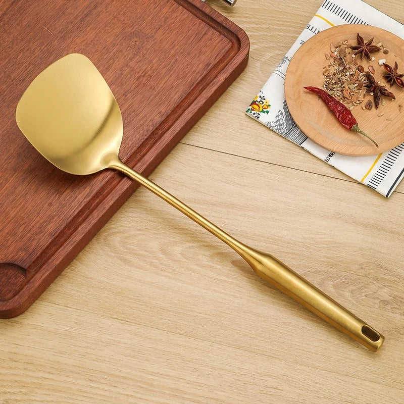 Spatule dorée en acier inoxydable des ustensiles de chef pour cuisine élégante