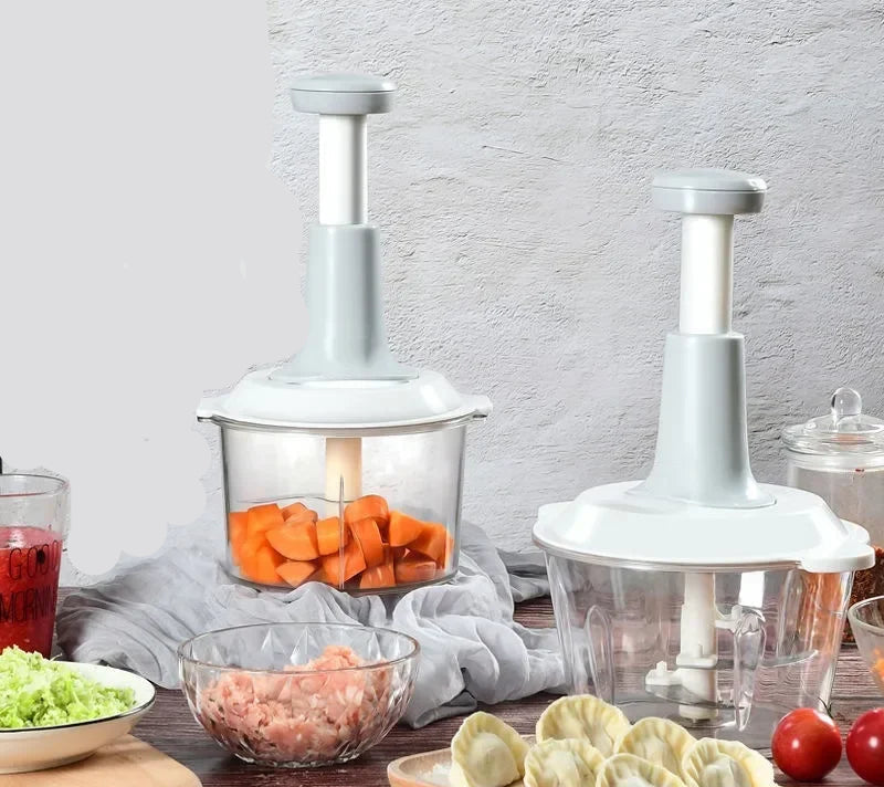 Hachoir Manuel Multifonction Inox – Broyeur Légumes et Viandes avec récipient transparent et légumes coupés à l'intérieur