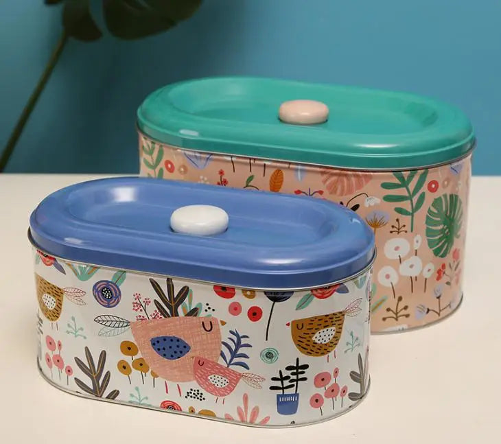 Boîtes métal  – Stockage hermétique : deux boîtes ovales décorées d'oiseaux et de fleurs avec couvercles bleu et vert menthe