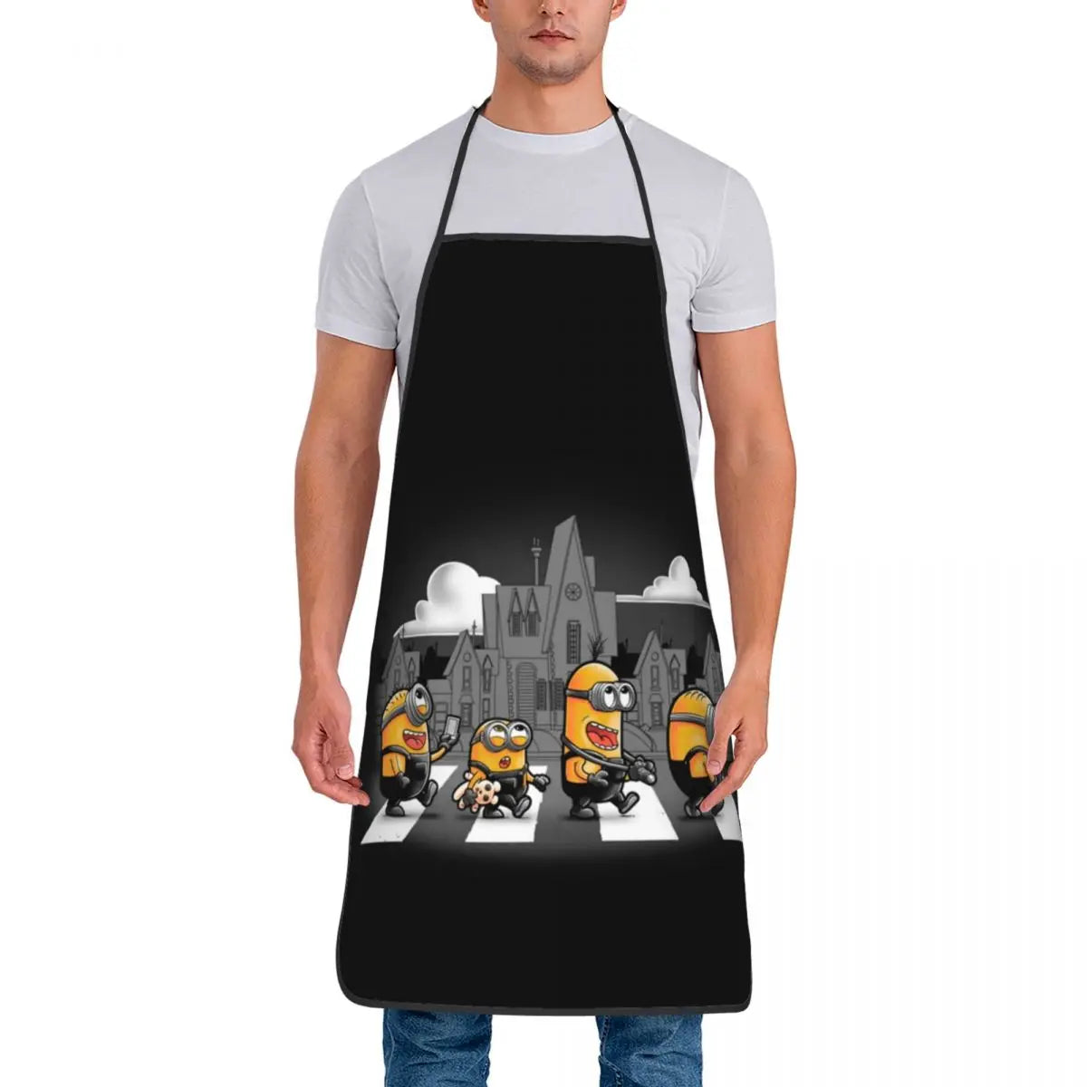 Tablier Cuisine Imperméable MINISO noir avec design amusant de personnages jaunes en crossing zebré