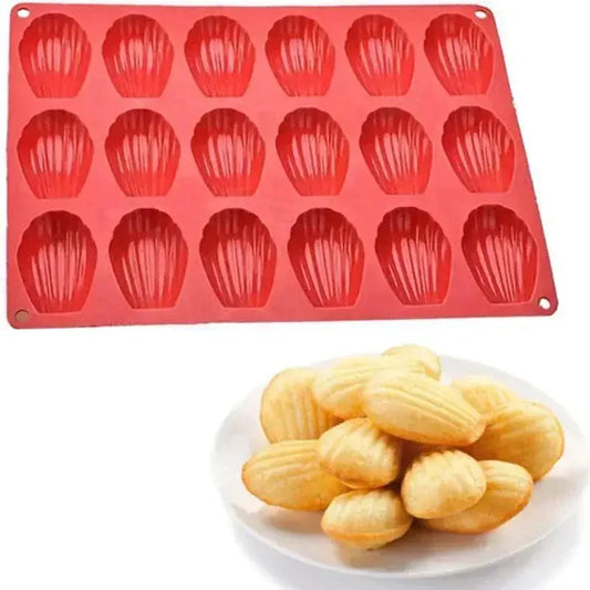 Moule madeleine silicone rouge de 16 cavités pour réaliser des madeleines parfaites à la maison
