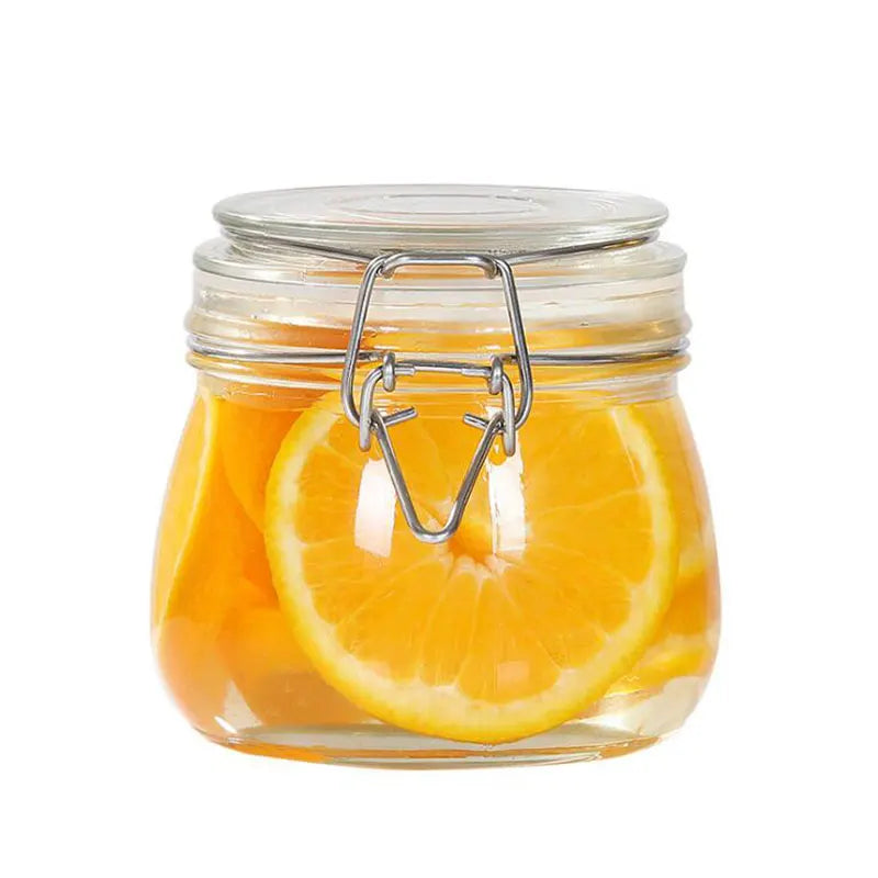 Pot de Rangement Hermétique en Verre avec fermeture métal contenant des tranches d orange