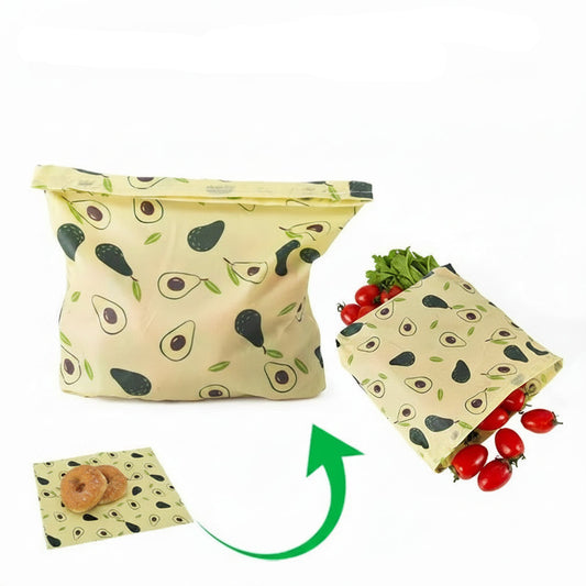Sacs en cire d’abeille réutilisables pour conserver les aliments avec motifs d'avocat et tomates.