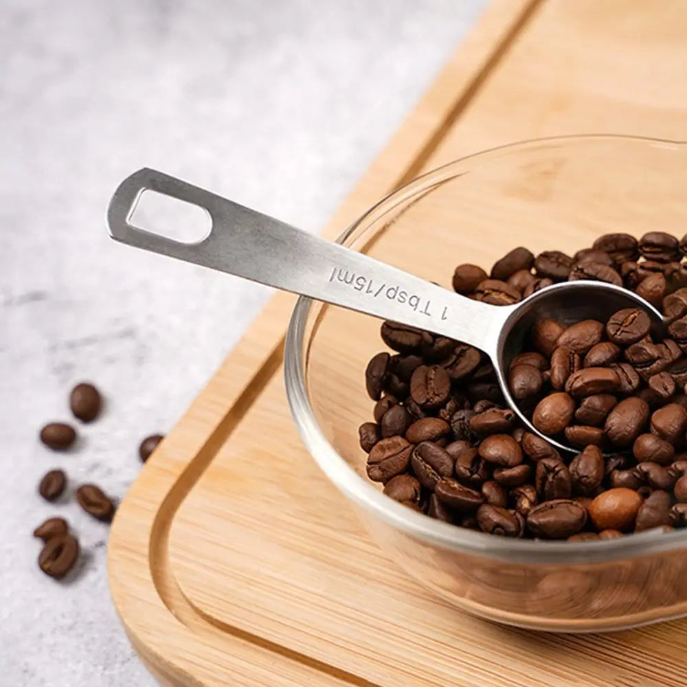 Set Cuillères Doseuses Inox 304 – 7 ou 11 Pièces Précises avec café en grains dans un bol en verre