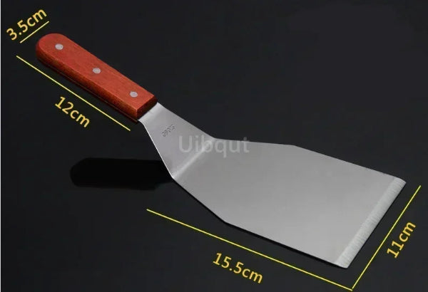 Spatule Inox Professionnelle avec manche en bois marron et lame large en acier inoxydable