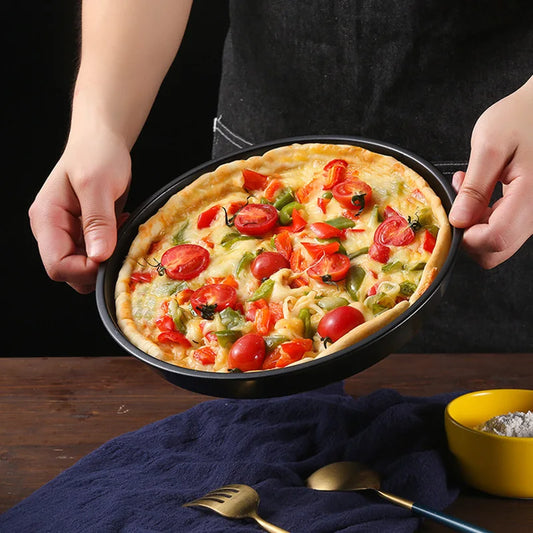 Plat à pizza rond avec revêtement antiadhésif

