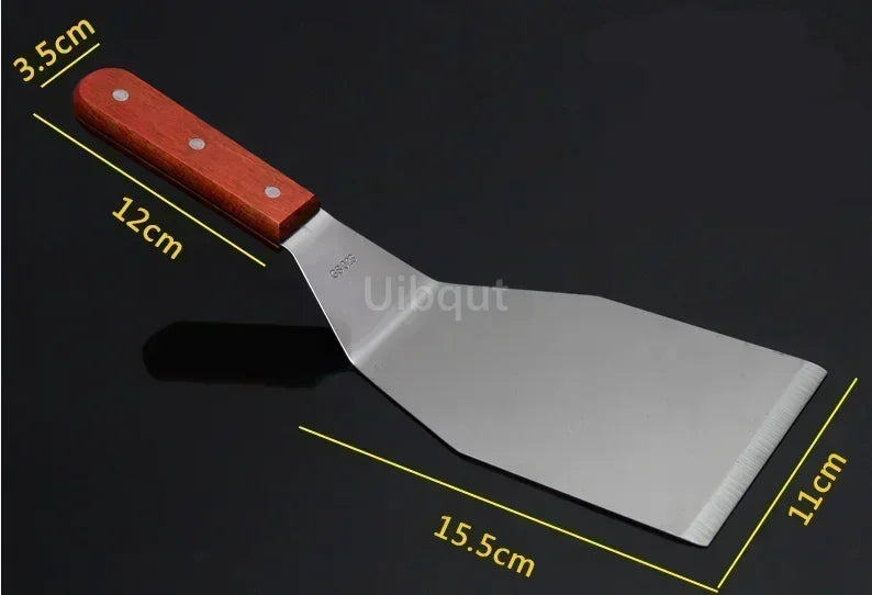Spatule en inox idéale pour retourner les aliments