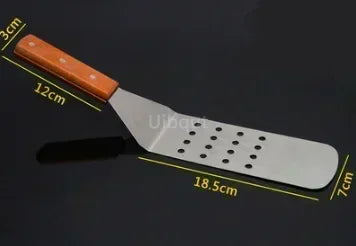 Spatule pratique pour retourner les viandes et légumes