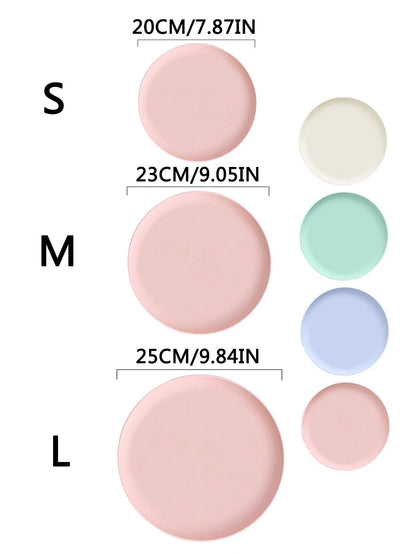 Assiettes rondes incassables en paille de blé de différentes tailles avec des couleurs pastel