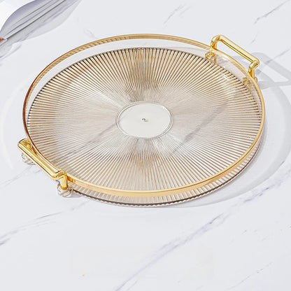 Plateau Rond Acrylique avec Poignées Dorées – Déco & Service. Plateau transparent élégant à motifs rayonnants