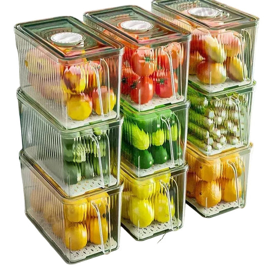 Boîte hermétique pour frigo avec égouttoir empilée, idéale pour conserver fruits et légumes frais.