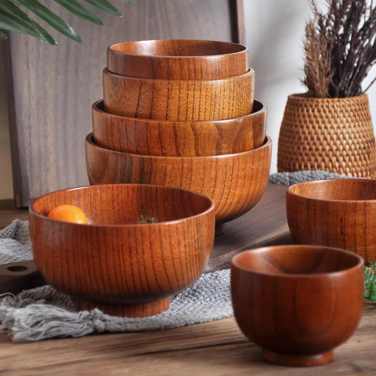 Bol en Bois Naturel Jujubier – Vaisselle Artisanale Durable avec plusieurs bols empilés sur une table en bois