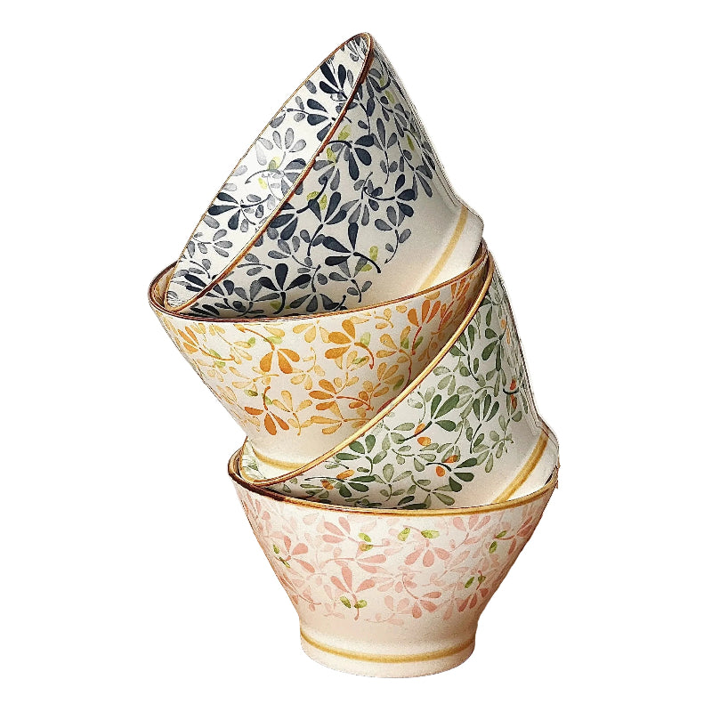 Lot de 4 bols en porcelaine à motifs floraux empilés avec des couleurs vives et élégantes