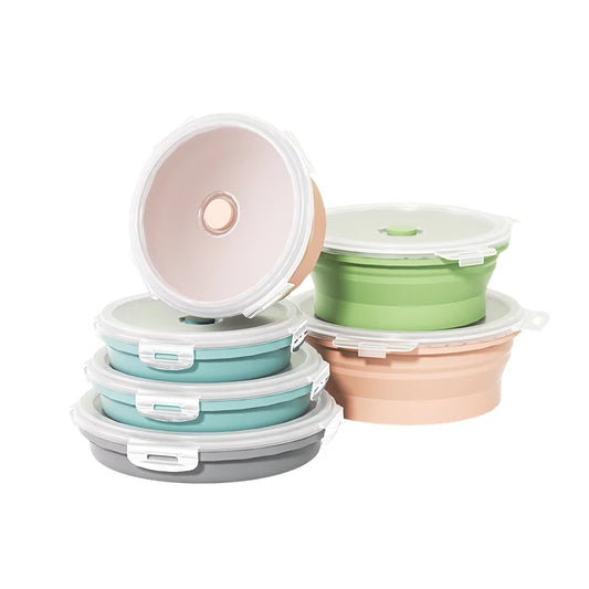 Bol Silicone Alimentaire Rond avec couvercles, résistant et réutilisable, en plusieurs couleurs empilés.