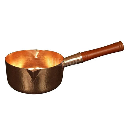 Casserole en cuivre avec manche en bois – L’élégance artisanale au service des cuissons précises
