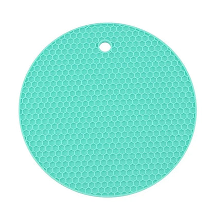 Dessous de Plat Silicone 18cm – Antidérapant & Résistant. Sous-plat rond en silicone vert menthe avec texture alvéolée et trou