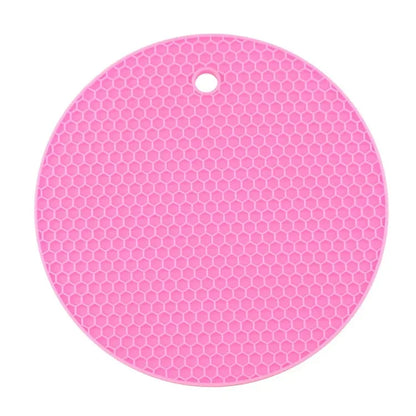 Ustensile de chef Dessous de Plat Silicone 18cm – Antidérapant & Résistant. rond rose à texture nid d'abeille avec trou