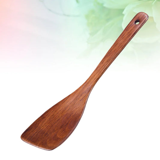 Spatule en Bois Cuisine – Durable & Antiadhésive. Spatule en bois brun, manche percé, idéale pour poêler et remuer