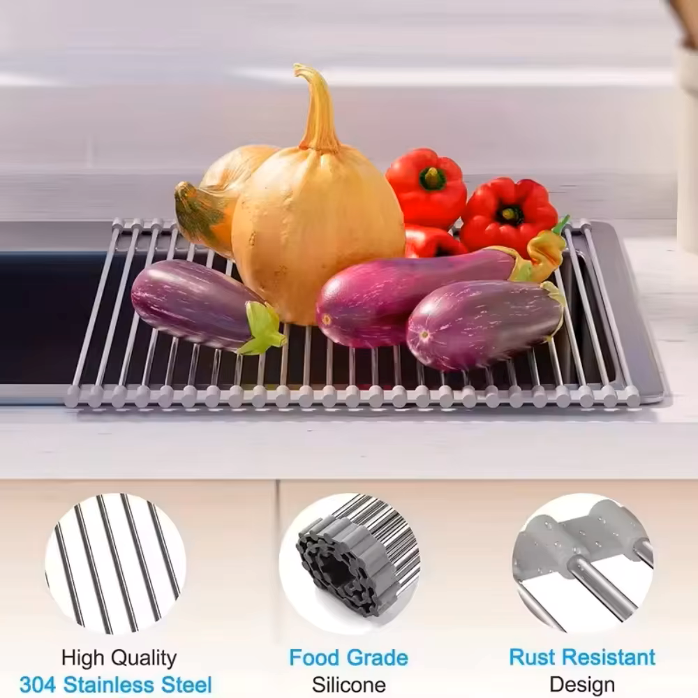 Égouttoir à Vaisselle Extensible Inox avec des légumes frais sur un évier moderne.