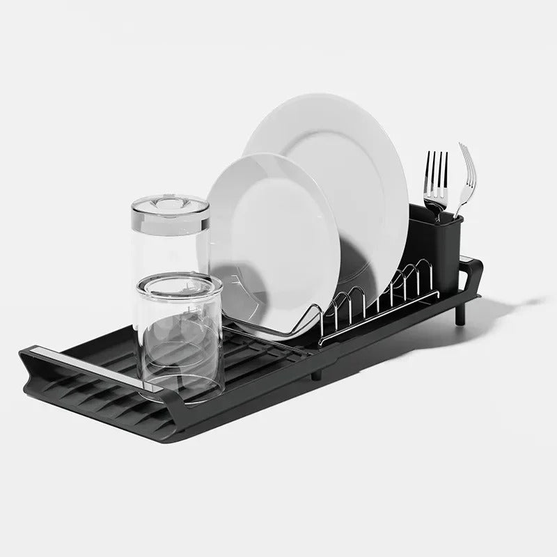 Égouttoir à Vaisselle Extensible pour Petite Cuisine en noir avec assiettes, verres et couverts.
