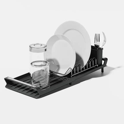 Égouttoir à Vaisselle Extensible pour Petite Cuisine en noir avec assiettes, verres et couverts.