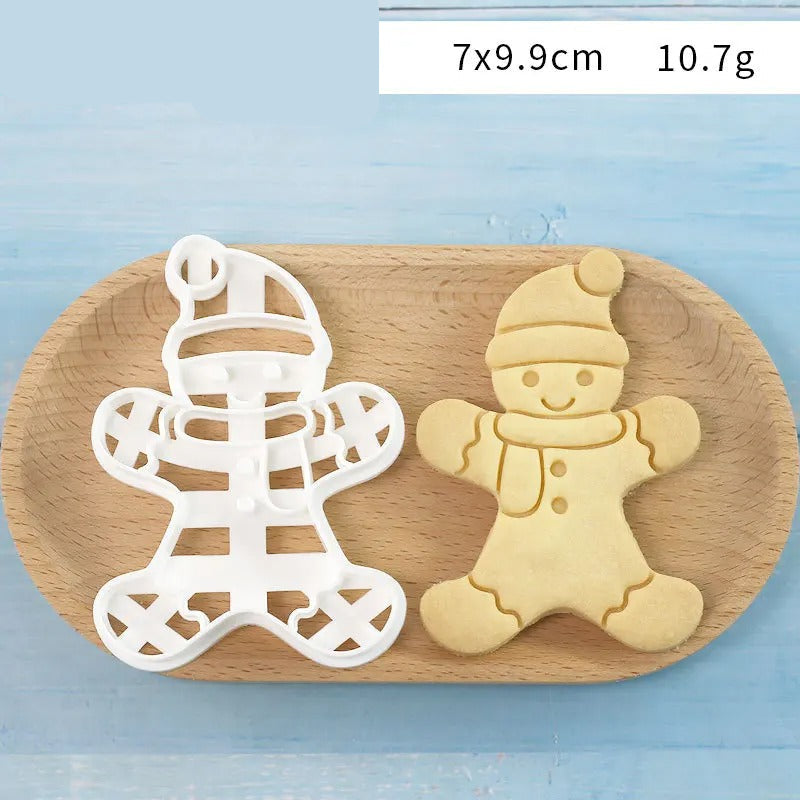 Emporte-Pièce Bonhomme en Pain d’Épices – 7 Modèles en silicone avec biscuits dorés sur un plateau en bois