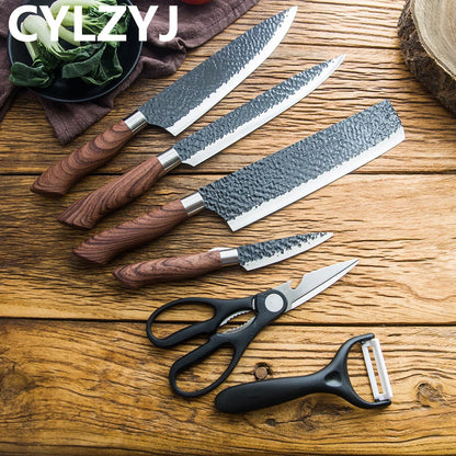 Set de Couteaux de Cuisine 6 Pièces – Acier Inox, Ultra Tranchants & Ergonomiques disposés sur une table en bois