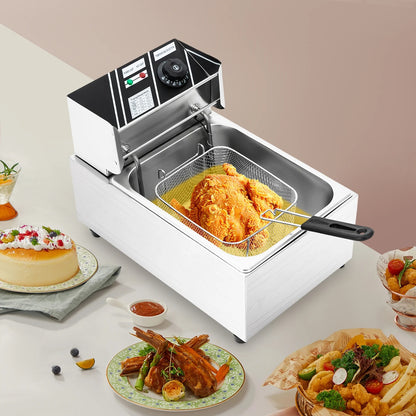 Friteuse électrique inox 6L 2500W avec des aliments frits dorés et croustillants dans le panier