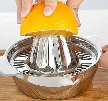 Presse-Agrumes Manuel & Mixeur à Fruits en acier inoxydable avec un orange pressé pour un jus frais