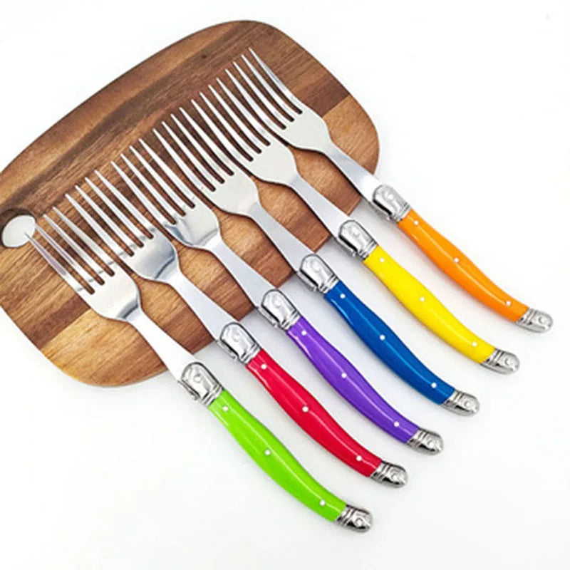 Set de 6 Fourchettes Jaswehome avec poignées colorées sur une planche en bois