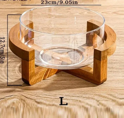 Bol à Salade en Verre avec Base en Bois Élégante sur une table en bois, idéal pour servir des salades.