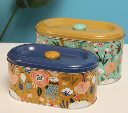 Boîtes métal  – Stockage hermétique : deux boîtes ovales en métal motif floral avec couvercles colorés pour conserver aliments