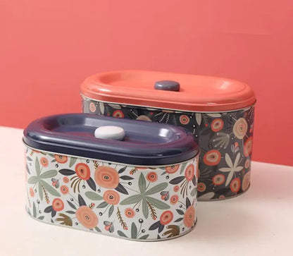 Boîtes métal  – Stockage hermétique Ustensile de chef lot de deux boîtes ovales en métal à motifs floraux et couvercles colorés