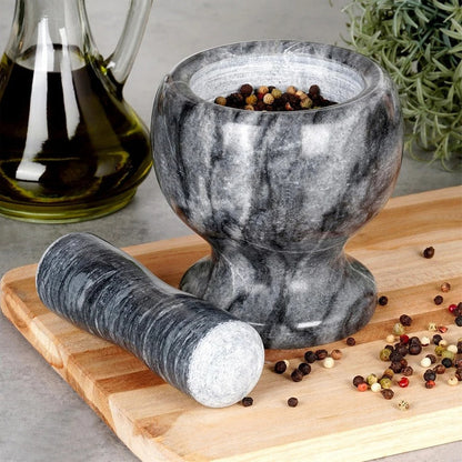 Mortier Pilon Cuisine en marbre avec pilon pour un mélange et broyage facile des épices.