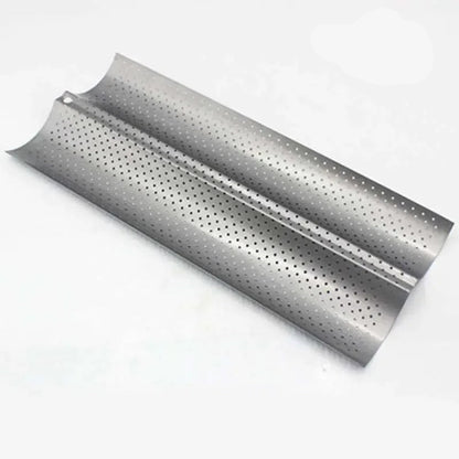 Plaque de cuisson pour pain rainuré en acier au carbone avec perforations pour une cuisson uniforme