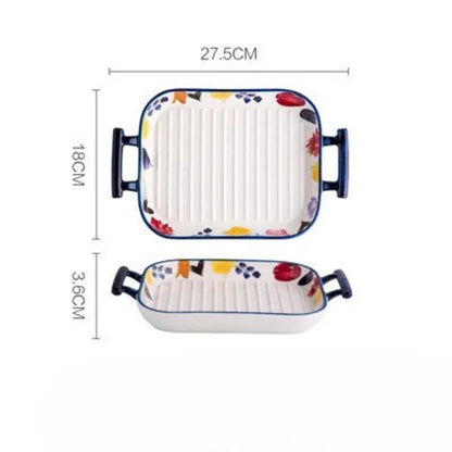 Plat de cuisson en céramique rectangulaire avec des motifs colorés et des anses pratiques