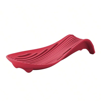 Porte-cuillère en silicone pour cuisine en rouge, adapté pour éviter les débordements pendant la cuisson