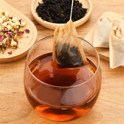 Sachets de Thé Jetables Naturels – Infusion Écologique dans un verre avec des ingrédients pour une infusion savoureuse