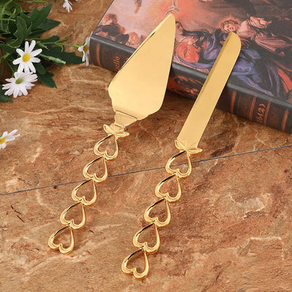 Set Couteau et Pelle à Gâteau Or – Élégant & Durable avec des poignées en forme de cœur