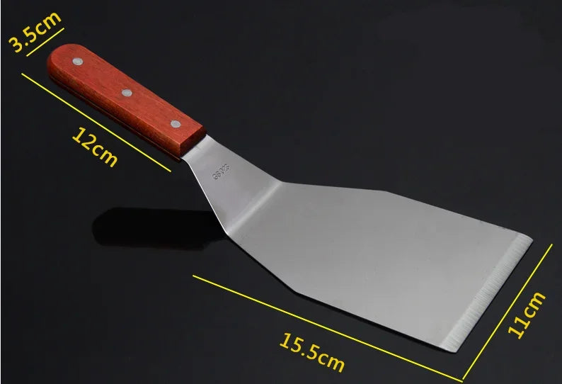 Spatule de Cuisine Inox avec poignée en bois, dimensions 15.5cm x 11cm, idéale pour la cuisson