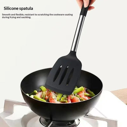 Spatule en silicone résistante à la chaleur pour poêle antiadhésive utilisée pour frémir des légumes