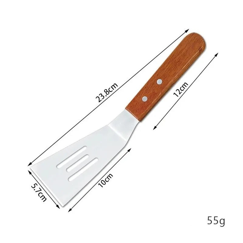 Spatule inox avec manche en bois, parfaite pour cuisiner et retourner les aliments avec facilité.