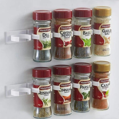 Support à Épices Mural Sans Perçage – Lot de 4 avec bocaux d'épices en verre sur un mur blanc