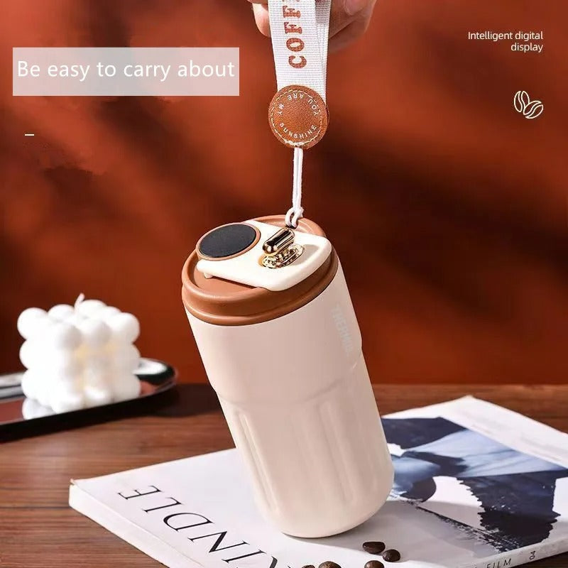 Thermos inox intelligent 400 ml avec écran température, facile à transporter avec une sangle pratique.